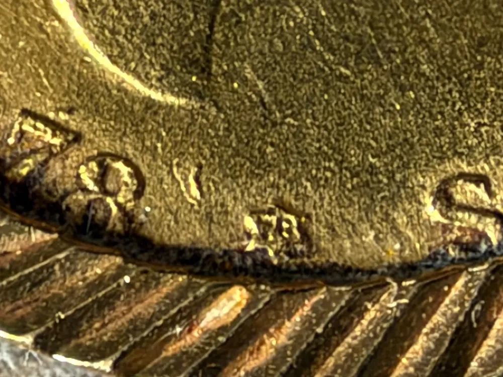 Detalle macro de la moneda de Alfonso XII de 1878